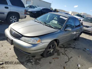 1999 Mercury Mystique с VIN 1MEFM66L5XK639295, выставлен на аукционе Copart как лот 43658735 с пробегом 130 522 миль миль и Списание • Salvage title. История ставок и продаж доступна на DreamBid. Изображение 1.