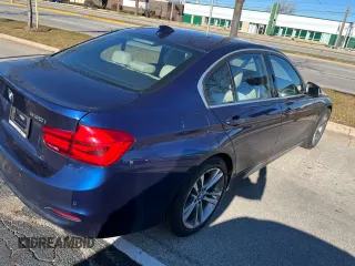 2017 BMW 3 Series 330i with VIN WBA8B9C53HK884571, listed as a Copart auction lot 86259974 with 42,771 mi miles and Clean Title. Bid and sale history available at DreamBid. Image 4.