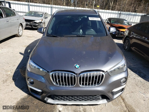 2018 BMW X1 xDrive28i with VIN WBXHT3C31J5K27206, listed as a Copart auction lot 45941755 with 99,777 mi miles and Salvage Title. Bid and sale history available at carsss.com. Image 5.