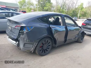 2023 Tesla Model Y Performance z VIN 7SAYGDEFXPF767971, wystawiony jako IAAI lot #42198881 z przebiegiem 32 442 mil mil oraz . Historia ofert i sprzedaży dostępna na DreamBid. Obrazek 4.
