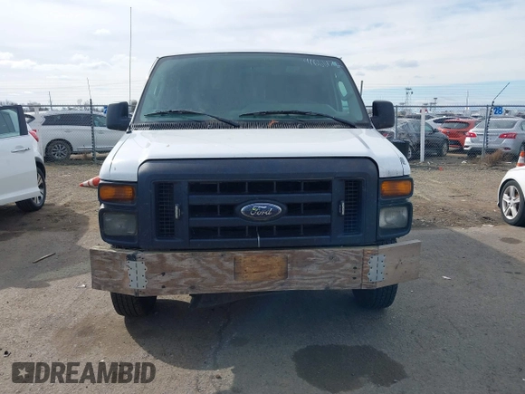 2012 Ford Econoline Cargo Commercial with VIN 1FTNE1EW0CDB06455, listed as a IAAI auction lot 41666172 with 270,816 mi miles and . Bid and sale history available at carsss.com. Image 12.