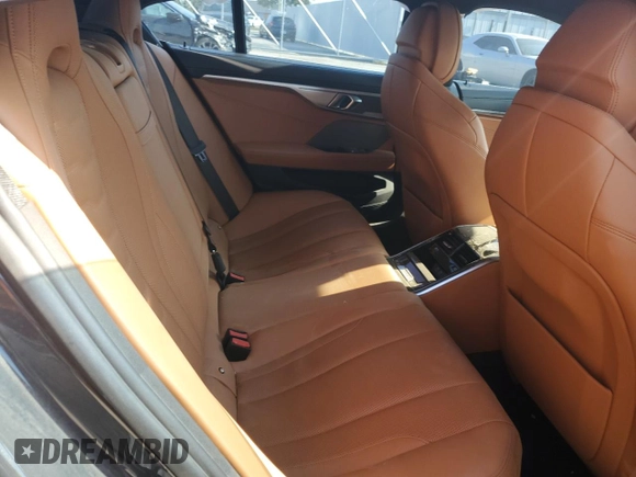 2021 BMW 8 Series M850i с VIN WBAGV8C04MCF78813, выставлен на аукционе Copart как лот 68984614 с пробегом Не указан миль и Списание • Salvage title. История ставок и продаж доступна на DreamBid. Изображение 10.