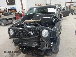 2014 Jeep Patriot Latitude with VIN 1C4NJPFA9ED887903, listed as a IAAI auction lot 41228274 with 82,225 mi miles and . Bid and sale history available at carsss.com. Image 12.