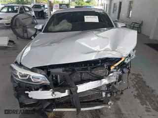 2020 BMW M2 Competition with VIN WBS2U7C01L7F87723, listed as a IAAI auction lot 40319156 with 55,309 mi miles. Bid and sale history available at carsss.com. Image 13.