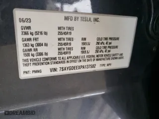 2023 Tesla Model Y Long Range with VIN 7SAYGDEEXPA137582, listed as a Copart auction lot 46869265 with 16,474 mi miles and Salvage Title. Bid and sale history available at carsss.com. Image 14.
