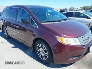 2012 Honda Odyssey EX-L with VIN 5FNRL5H6XCB125081, listed as a IAAI auction lot 42680690 with 152,106 mi miles and . Bid and sale history available at DreamBid. Image 1.