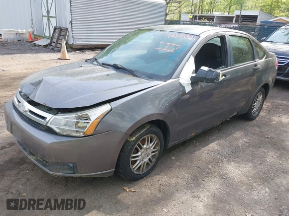 2010 Ford Focus SE with VIN 1FAHP3FNXAW125238, listed as a IAAI auction lot 42109371 with 179,761 mi miles. Bid and sale history available at carsss.com. Image 2.