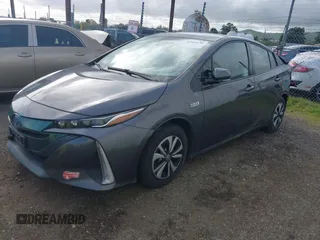 2017 Toyota Prius Plus z VIN JTDKARFP8H3054476, wystawiony jako IAAI lot #41914158 z przebiegiem 146 902 mil mil oraz . Historia ofert i sprzedaży dostępna na DreamBid. Obrazek 18.