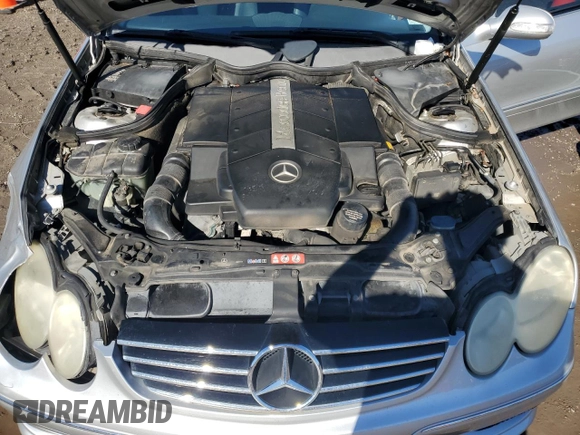 2005 Mercedes-Benz CLK 500 z VIN WDBTJ75J05F139522, wystawiony jako Copart lot #80596524 z przebiegiem 95 997 mil mil oraz Szkody całkowita. Historia ofert i sprzedaży dostępna na DreamBid. Obrazek 13.