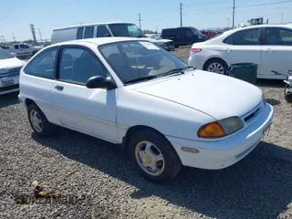 1995 Ford Aspire with VIN KNJLT05H4S6151892, listed as a IAAI auction lot 42023883 with 221,899 mi miles and . Bid and sale history available at DreamBid. Image 1.
