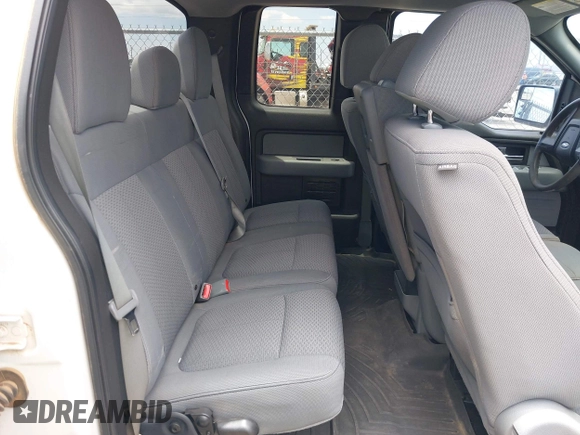 2012 Ford F-150 XL with VIN 1FTFX1EF9CKE10071, listed as a IAAI auction lot 42467147 with 215,509 mi miles and . Bid and sale history available at DreamBid. Image 8.