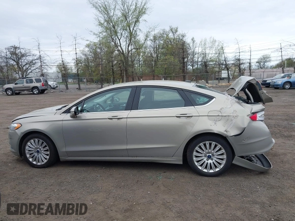 2015 Ford Fusion SE Hybrid with VIN 3FA6P0LU6FR210606, listed as a IAAI auction lot 42070466 with 123,043 mi miles and . Bid and sale history available at DreamBid. Image 15.