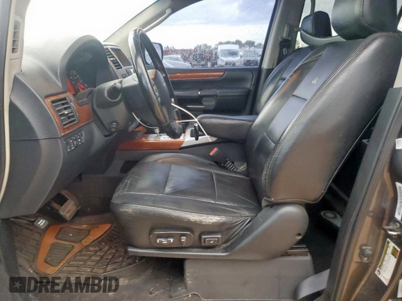 2009 Infiniti QX56 with VIN 5N3AA08DX9N902005, listed as a Copart auction lot 60665925 with 191,472 mi miles and Salvage title. Bid and sale history available at DreamBid. Image 7.