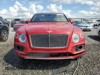 2017 Bentley Bentayga W12 z VIN SJAAC2ZV1HC014037, wystawiony jako Copart lot #73797634 z przebiegiem Nie podano mil oraz Szkoda całkowita • Salvage title. Historia ofert i sprzedaży dostępna na DreamBid. Obrazek 5.