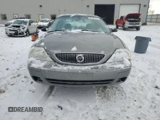 2004 Mercury Sable GS z VIN 1MEFM50U04A627214, wystawiony jako Copart lot #88798745 z przebiegiem 70 092 mil mil oraz Nie do naprawy • Non repairable. Historia ofert i sprzedaży dostępna na DreamBid. Obrazek 5.