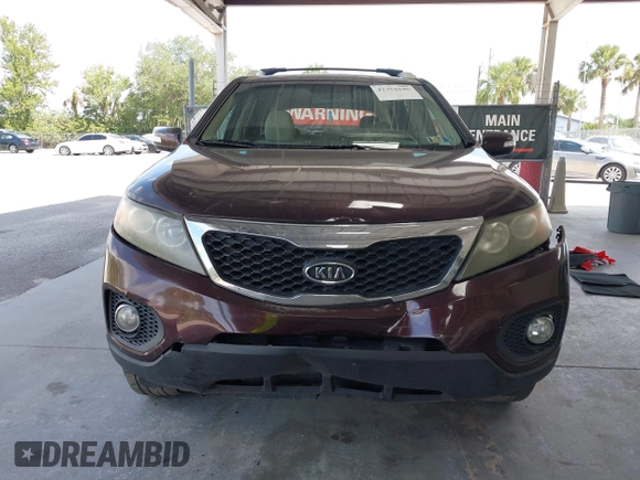 2012 Kia Sorento LX z VIN 5XYKT4A6XCG218424, wystawiony jako IAAI lot #42351646 z przebiegiem 185 016 mil mil oraz . Historia ofert i sprzedaży dostępna na DreamBid. Obrazek 12.