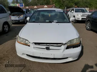 2000 Honda Accord LX z VIN 1HGCG1642YA080255, wystawiony jako Copart lot #53636855 z przebiegiem 146 478 mil mil oraz Szkoda całkowita • Salvage title. Historia ofert i sprzedaży dostępna na DreamBid. Obrazek 5.