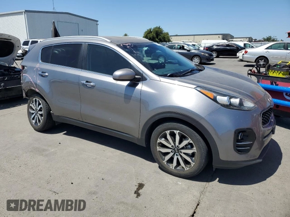 2017 Kia Sportage EX with VIN KNDPN3AC9H7101499, listed as a Copart auction lot 60712175 with 103,279 mi miles and Salvage title. Bid and sale history available at DreamBid. Image 4.