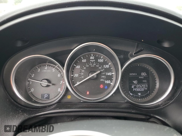 2015 Mazda CX-5 Sport z VIN JM3KE2BE4F0459532, wystawiony jako Copart lot #61049235 z przebiegiem 149 808 mil mil oraz Szkoda całkowita • Salvage title. Historia ofert i sprzedaży dostępna na DreamBid. Obrazek 9.