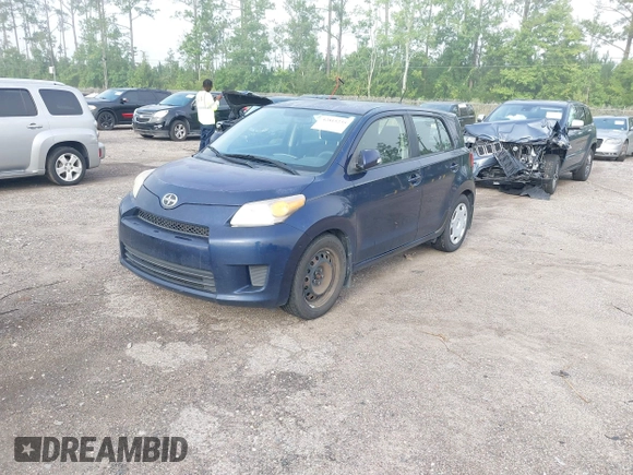 2014 Scion xD with VIN JTKKUPB46E1040700, listed as a IAAI auction lot 42815235 with 122,396 mi miles and . Bid and sale history available at DreamBid. Image 2.