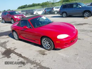 2003 Mazda MX-5 Miata Cloth with VIN JM1NB353030301893, listed as a IAAI auction lot 42852487 with 116,218 mi miles and . Bid and sale history available at DreamBid. Image 1.