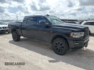 2020 Ram 2500 Laramie with VIN 3C6UR5NL1LG249759, listed as a Copart auction lot 68005064 with 137,130 mi miles and Salvage Title. Bid and sale history available at carsss.com. Image 4.
