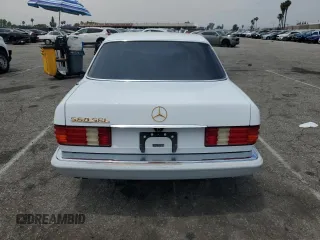 1990 Mercedes-Benz 560 z VIN WDBCA39E7LA505105, wystawiony jako Copart lot #58875015 z przebiegiem 88 261 mil mil oraz Szkoda całkowita • Salvage title. Historia ofert i sprzedaży dostępna na DreamBid. Obrazek 6.
