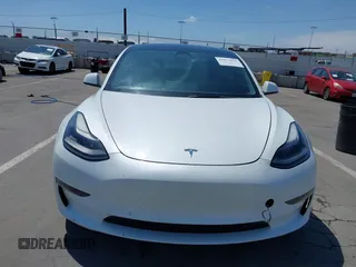 2022 Tesla Model 3 Long Range z VIN 5YJ3E1EB9NF113601, wystawiony jako IAAI lot #42173612 z przebiegiem 95 454 mil mil oraz . Historia ofert i sprzedaży dostępna na DreamBid. Obrazek 12.