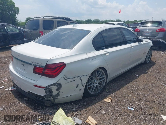 2015 BMW 7 Series 750Li xDrive with VIN WBAYF8C57FD655004, listed as a IAAI auction lot 42272205 with 77,677 mi miles and . Bid and sale history available at DreamBid. Image 4.