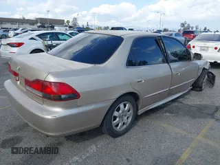 2001 Honda Accord EX z VIN 1HGCG66821A084618, wystawiony jako IAAI lot #41959020 z przebiegiem 272 671 mil mil oraz . Historia ofert i sprzedaży dostępna na DreamBid. Obrazek 4.