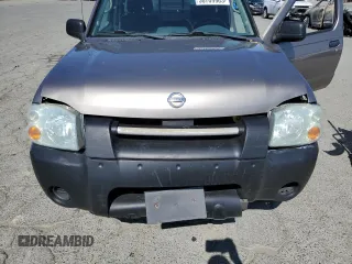 2004 Nissan Frontier XE with VIN 1N6DD26T14C412707, listed as a Copart auction lot 56789905 with 288,721 mi miles and Salvage title. Bid and sale history available at DreamBid. Image 11.