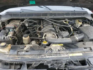 2004 Nissan Titan LE with VIN 1N6AA07A34N573514, listed as a Copart auction lot 54497765 with 240,033 mi miles and Salvage title. Bid and sale history available at DreamBid. Image 11.