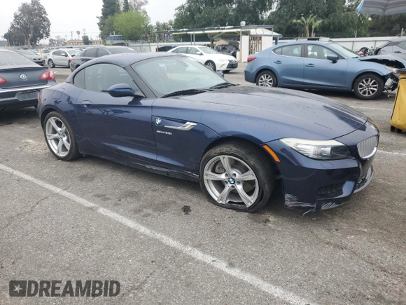 2012 BMW Z4 sDrive35i with VIN WBALM7C56CE384825, listed as a Copart auction lot 53083945 with 87,474 mi miles and Salvage Title. Bid and sale history available at carsss.com. Image 4.