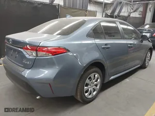 2024 Toyota Corolla Hybrid LE with VIN JTDBCMFE2RJ035365, listed as a IAAI auction lot 41550244 with 5,265 mi miles. Bid and sale history available at carsss.com. Image 4.