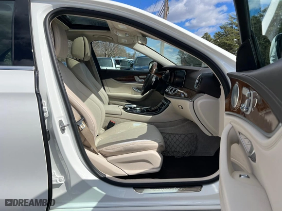 2017 Mercedes-Benz E-Class E 300 Luxury with VIN WDDZF4JBXHA103709, listed as a Copart auction lot 51218385 with 137,060 mi miles and Clean Title. Bid and sale history available at carsss.com. Image 5.