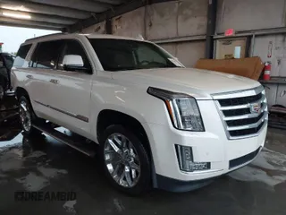 2015 Cadillac Escalade Premium z VIN 1GYS3NKJ8FR688489, wystawiony jako IAAI lot #41914908 z przebiegiem 98 775 mil mil oraz . Historia ofert i sprzedaży dostępna na DreamBid. Obrazek 1.