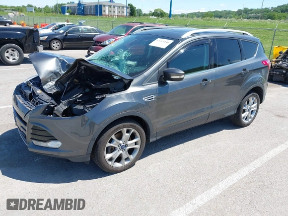 2015 Ford Escape Titanium z VIN 1FMCU9J92FUB01007, wystawiony jako IAAI lot #42319246 z przebiegiem 90 782 mil mil oraz . Historia ofert i sprzedaży dostępna na DreamBid. Obrazek 18.