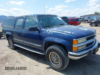 1994 Chevrolet Suburban z VIN 1GNGK26N4RJ406269, wystawiony jako IAAI lot #42504991 z przebiegiem 201 064 mil mil oraz . Historia ofert i sprzedaży dostępna na DreamBid. Obrazek 1.