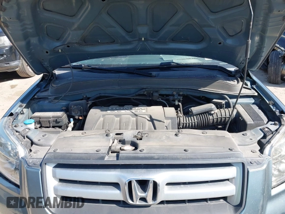 2006 Honda Pilot EX-L with VIN 2HKYF18506H521822, listed as a IAAI auction lot 42012612 with 187,946 mi miles and . Bid and sale history available at DreamBid. Image 10.