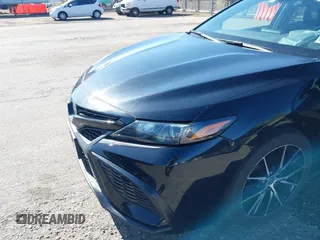 2022 Toyota Camry SE with VIN 4T1G11AK1NU688670, listed as a IAAI auction lot 42168847 with 54,975 mi miles. Bid and sale history available at carsss.com. Image 6.