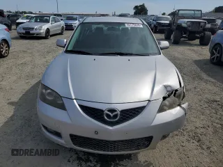 2009 Mazda 3 i Touring Value with VIN JM1BK32G791209810, listed as a Copart auction lot 55175635 with 115,234 mi miles and Salvage Title. Bid and sale history available at DreamBid. Image 5.