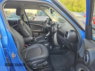 2012 MINI Countryman z VIN WMWZB3C50CWM30636, wystawiony jako Copart lot #58615615 z przebiegiem 123 289 mil mil oraz Tytuł czysty. Historia ofert i sprzedaży dostępna na DreamBid. Obrazek 5.