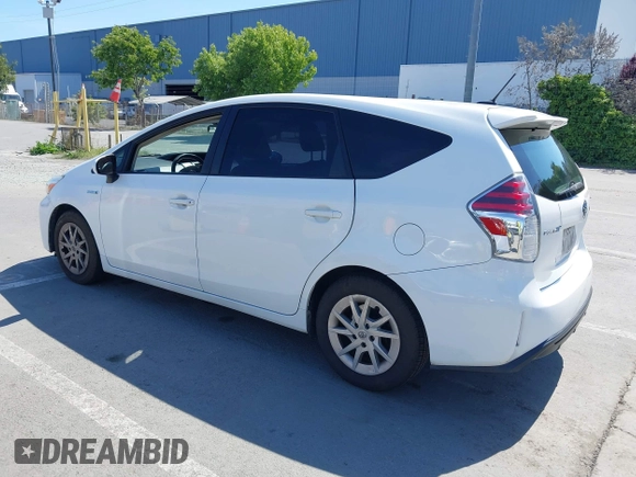 2016 Toyota Prius v Two with VIN JTDZN3EU5GJ051939, listed as a IAAI auction lot 42162040 with 275,213 mi miles. Bid and sale history available at carsss.com. Image 3.