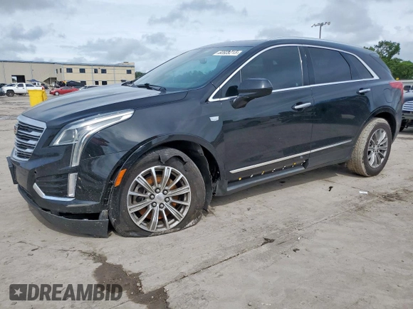 2017 Cadillac XT5 Luxury FWD with VIN 1GYKNBRS3HZ101867, listed as a Copart auction lot 60923215 with 130,209 mi miles and Salvage title. Bid and sale history available at DreamBid. Image 1.