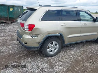 2011 Jeep Grand Cherokee Laredo with VIN 1J4RR4GG8BC558018, listed as a IAAI auction lot 42347367 with 180,334 mi miles and . Bid and sale history available at DreamBid. Image 6.