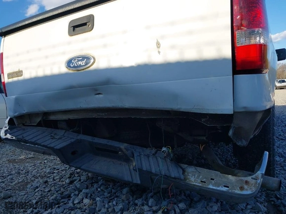 2004 Ford F-150 XL with VIN 1FTPX12544NB76406, listed as a IAAI auction lot 41396355 with 250,958 mi miles. Bid and sale history available at carsss.com. Image 6.
