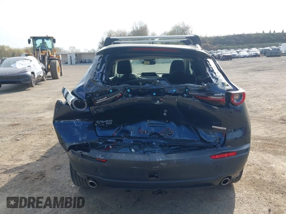2021 Mazda CX-30 Premium with VIN 3MVDMBDM4MM238367, listed as a IAAI auction lot 42124335 with 31,120 mi miles and . Bid and sale history available at DreamBid. Image 6.