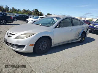 2009 Mazda 6 i Sport with VIN 1YVHP81H995M48510, listed as a Copart auction lot 66139985 with 171,833 mi miles and Salvage title. Bid and sale history available at DreamBid. Image 1.