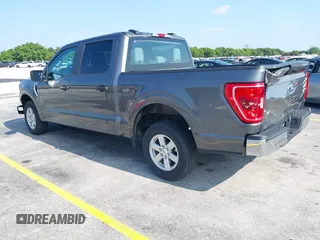 2023 Ford F-150 XL with VIN 1FTEW1C55PKD33889, listed as a IAAI auction lot 42334571 with 41,054 mi miles and . Bid and sale history available at DreamBid. Image 3.