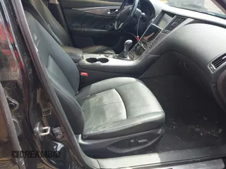 2014 Infiniti Q50 Premium z VIN JN1BV7AR4EM695666, wystawiony jako IAAI lot #42437594 z przebiegiem 141 008 mil mil oraz . Historia ofert i sprzedaży dostępna na DreamBid. Obrazek 5.